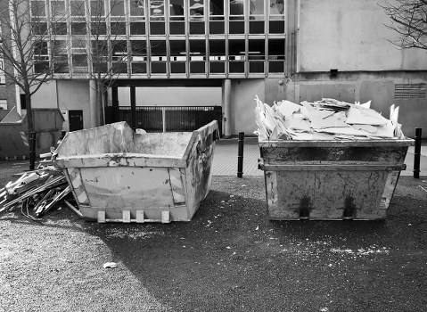 Construction site in Soho with waste containers