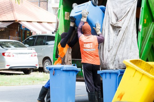 Professional waste management team sorting recyclables